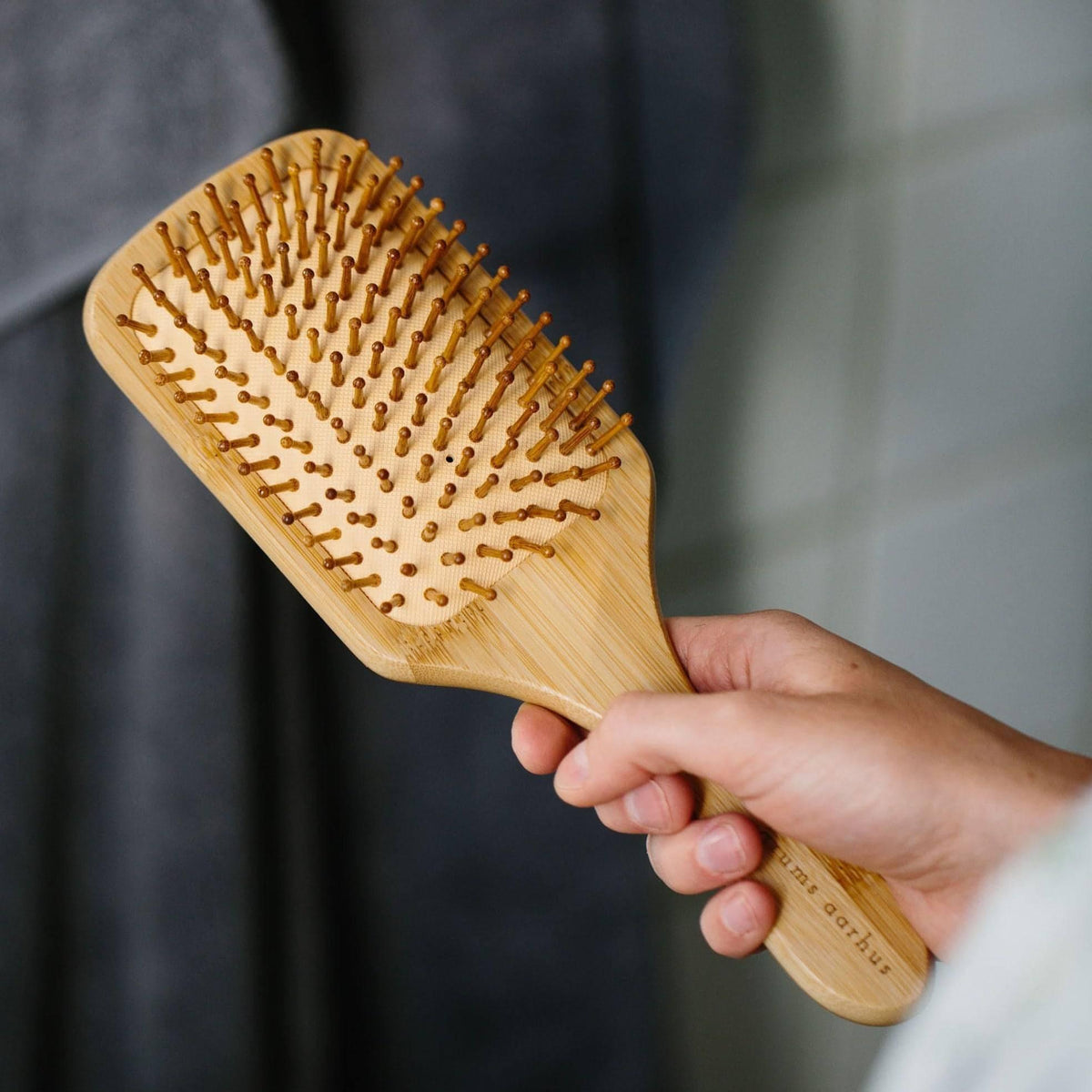 grums Bamboo Hairbrush. Ethically Sourced Luxury Hair Care Deed